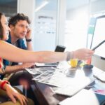 A young girl and boy talking about the Logo creation process